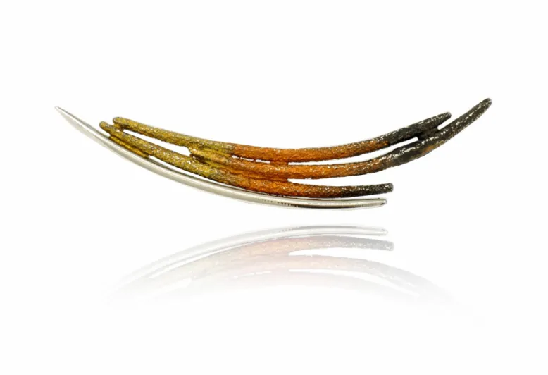 Dynamic ochre pendant