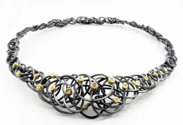 Collar CAOS, 17 diamantes, plata y oro
