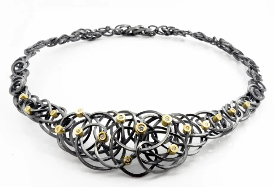 Collar CAOS, 17 diamantes, plata y oro