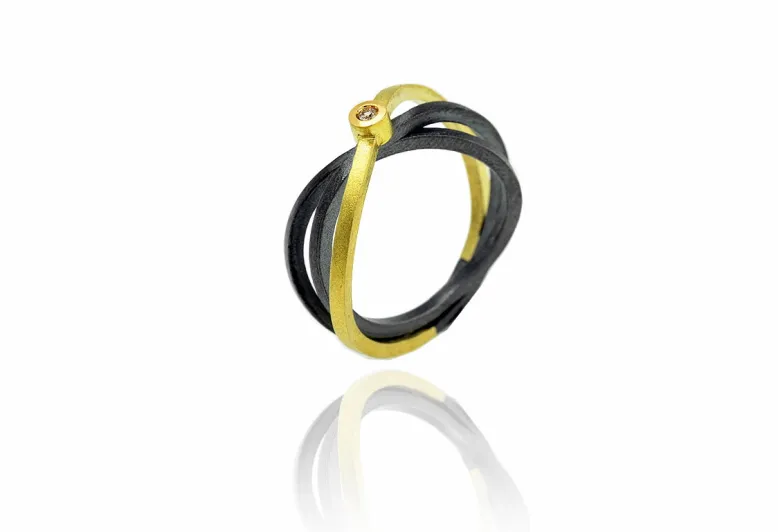 Ring Concentric mit Goldstrang, Diamant in runder Fassung und 2 Silbersträngen
