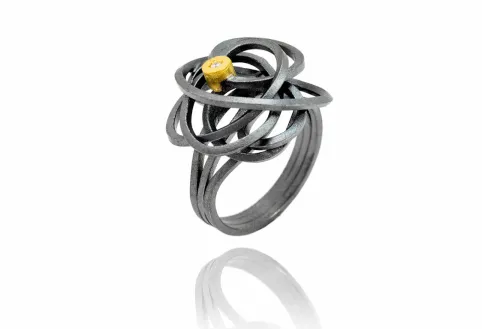 Ring Caos, Silber und Gold und 1 Diamant