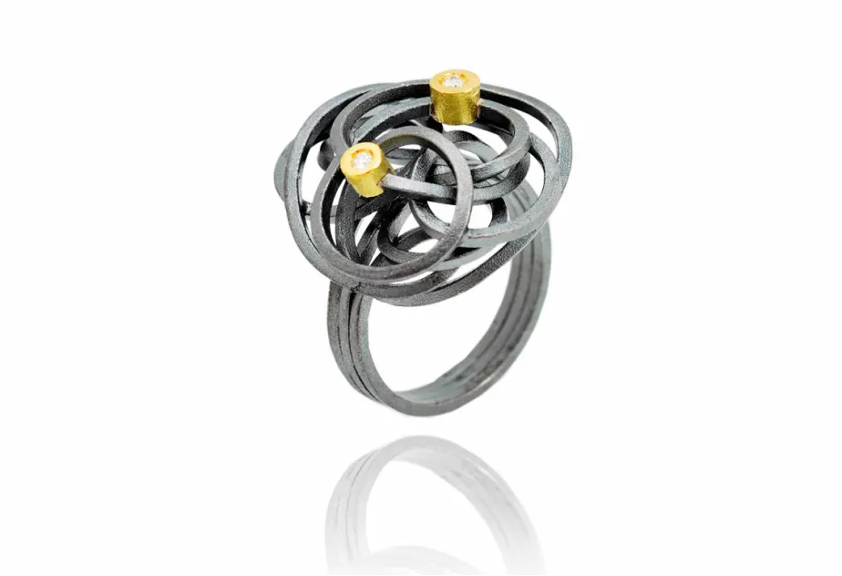 Anillo Caos, plata y oro con 2 diamantes