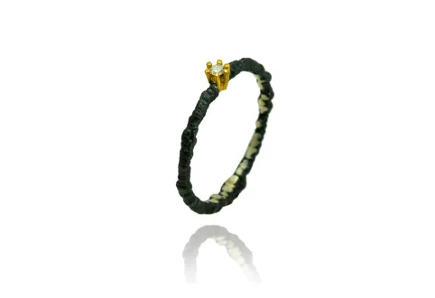 Anillo Bremi, plata y oro con diamante en engaste de oro