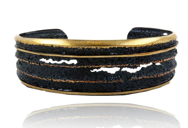 Pulsera Sinera negro dorado