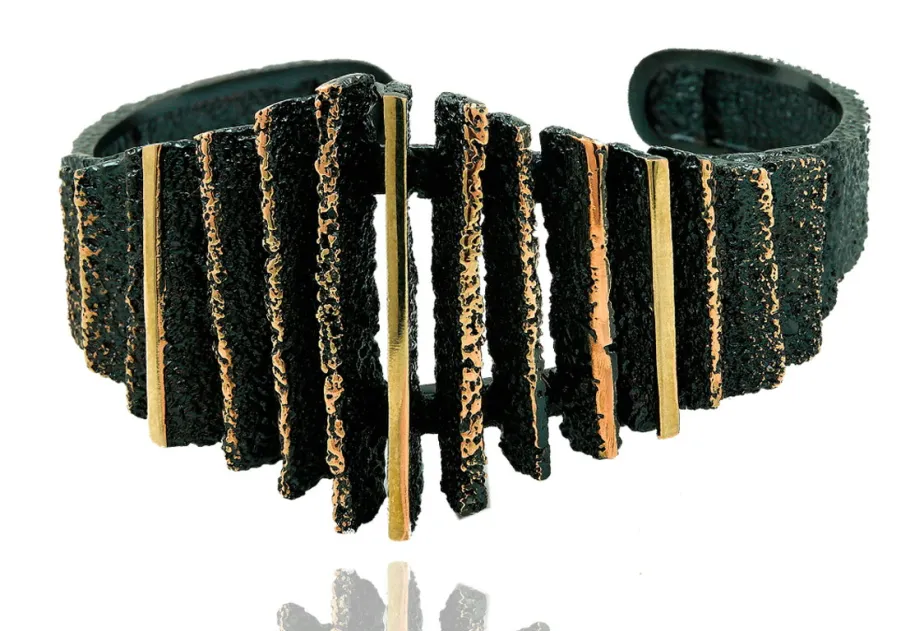 Pulsera Junc negro dorado