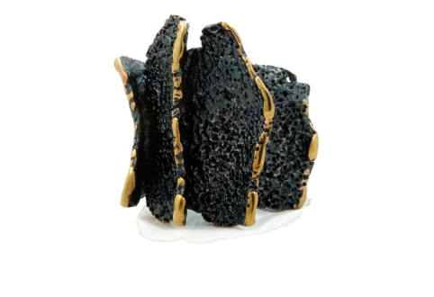 Anillo Atlas negro dorado