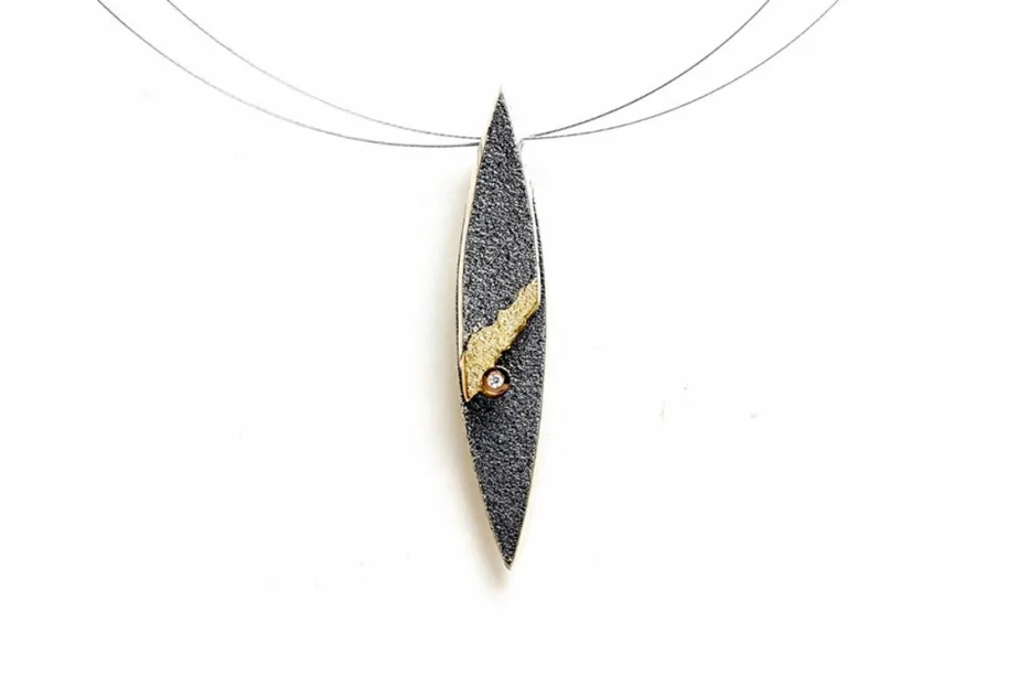 Colgante Nairobi, plata y oro con diamante