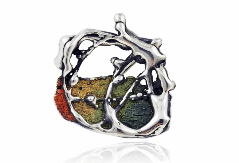 Broche surrealista verde-ocre