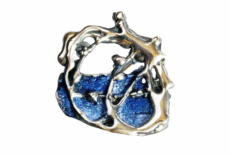 Blaue Brosche Surrealista